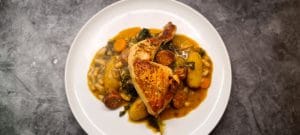Read more about the article Baked Chicken Leg with Chorizo, Beans, Pesto and Kale