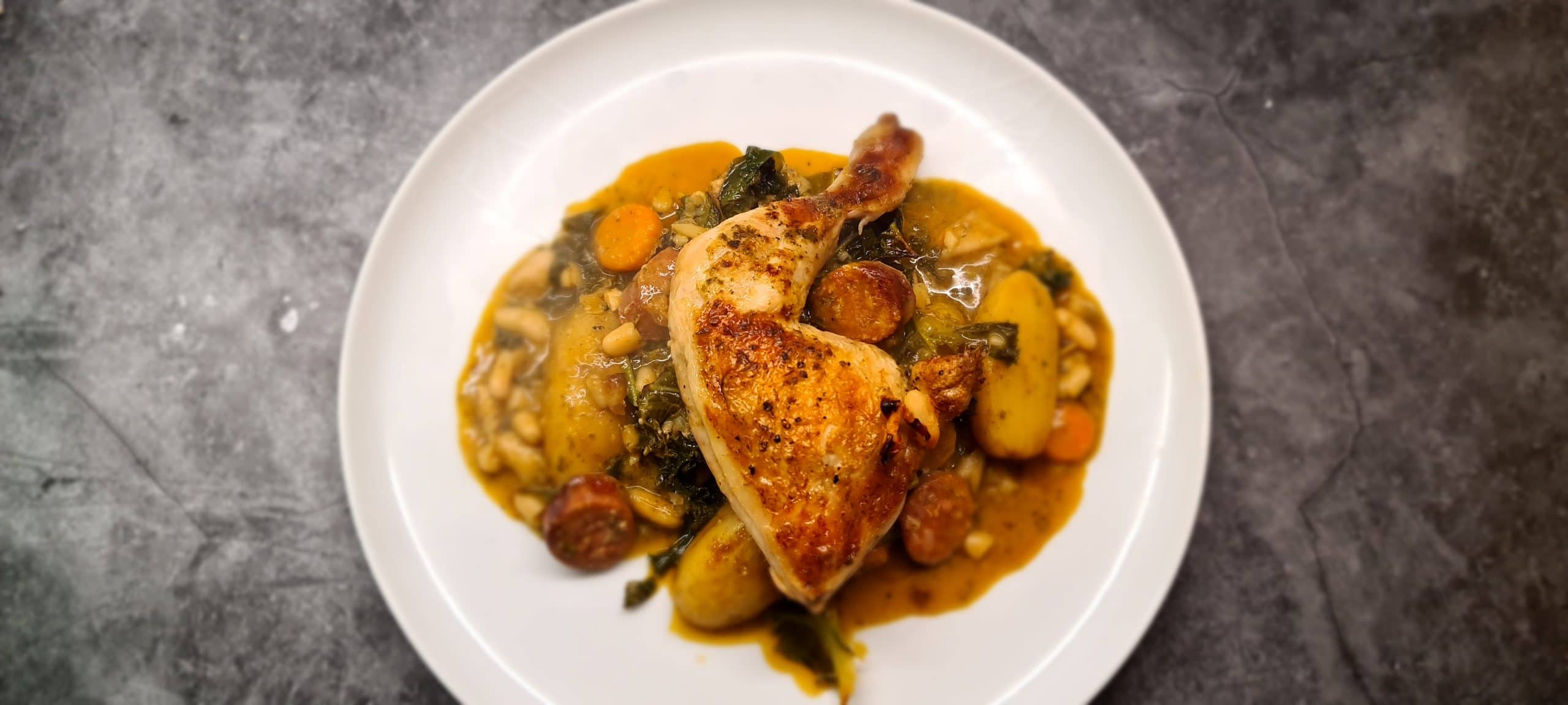 You are currently viewing Baked Chicken Leg with Chorizo, Beans, Pesto and Kale