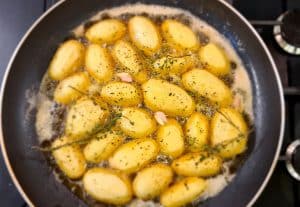Frying off the potatoes
