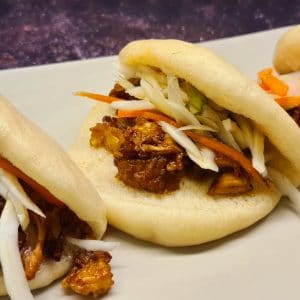 Steamed Bao buns with BBQ Pork and pickle